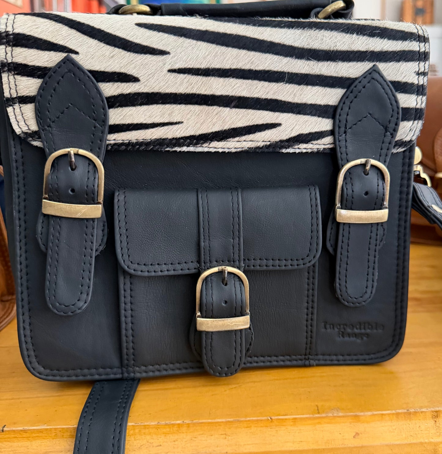 Black zebra leather bag